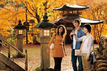 Clients on a guided private tour in Kyoto in autumn