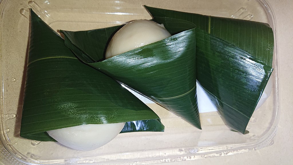 Chimaki elongated pieces of mochi pounded rice in dwarf bamboo leaves.