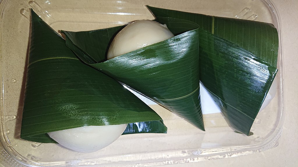 Chimaki elongated pieces of mochi pounded rice in dwarf bamboo leaves.