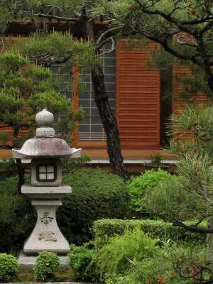 Classic view of a Japanese temple garden and lantern