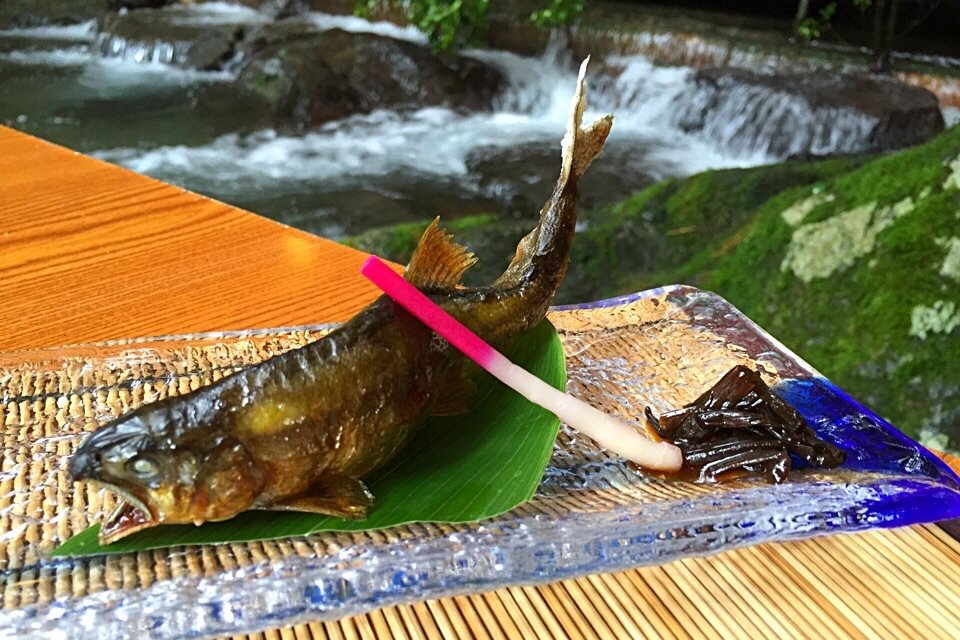 Summer is hot in Japan but on outdoor river platforms and locations you can enjoy ayu sweet fish and cool scenes like this one!