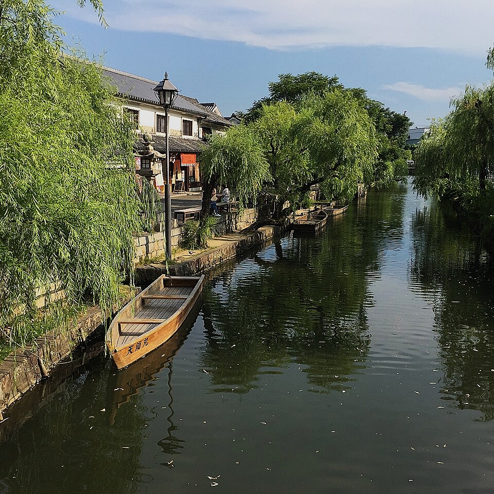 Okayama Prefecture's Kurashiki willow-lined kura storehouse canal district.