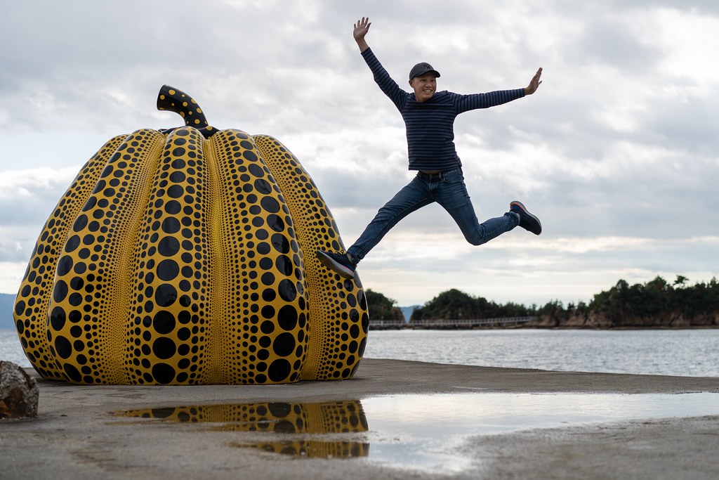 Kasuma Yayoi's world-famous pumpkin on a dock on Naoshima art island.