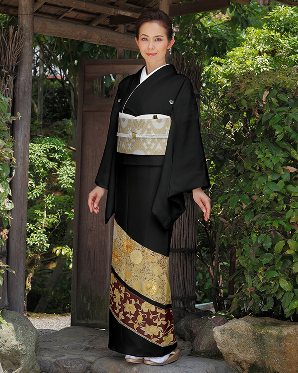 Making a kimono takes many years to learn and design is everything. This is a classic black background kimono for formal events like a Japanese wedding.