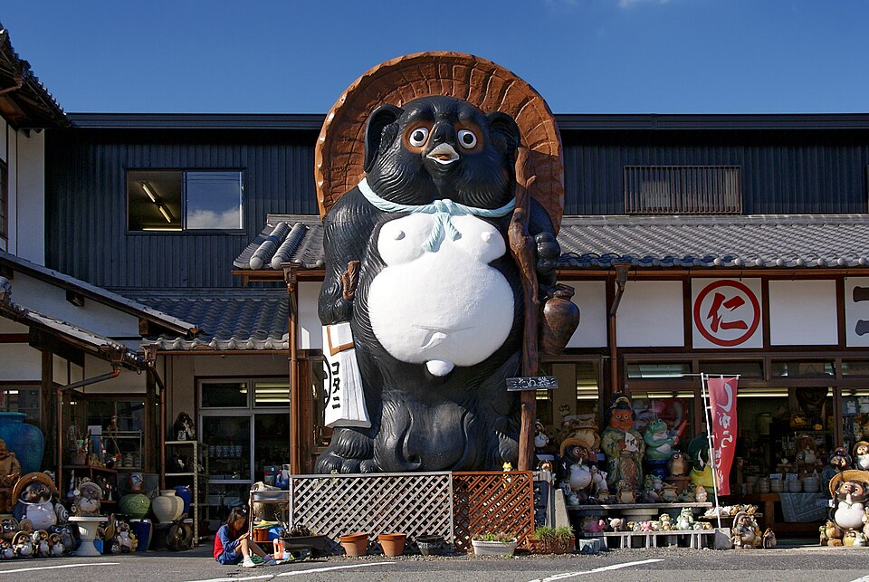 A huge ceramic Shiga Prefecture Shigaraki tanuki raccoon dog often at the entrance to bars and restaurants all over Japan.