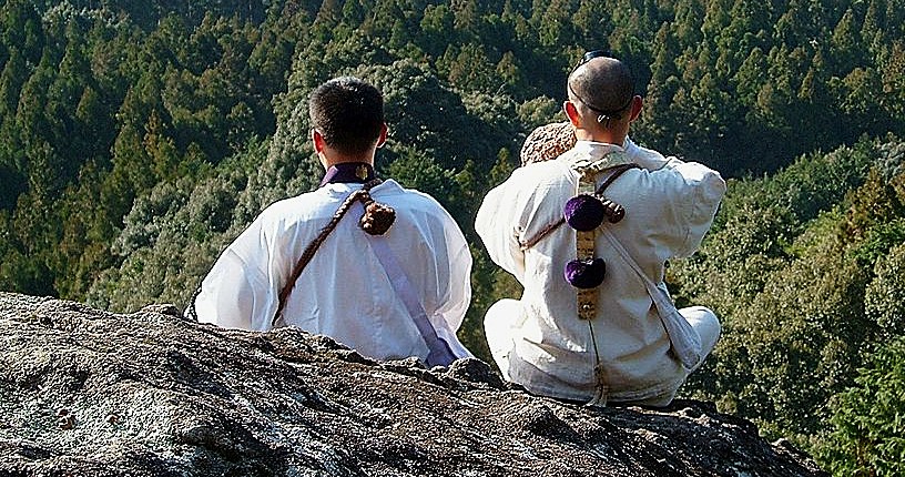 Two shugendo practitioners on pilgrimage en route to Wakayama Prefecture's Kumano area.